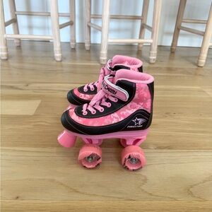Pink and Black Roller Skates